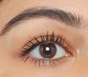 same woman with long, thick black lashes