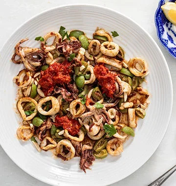 Pan-Seared Squid with Warm Spices, Olives, and Harissa