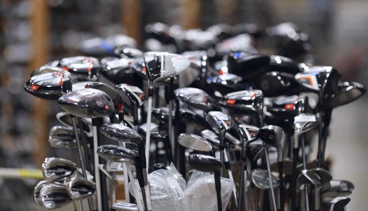 golf clubs in a warehouse