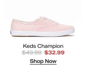 A side view of the Keds Champion Canvas Lace-Up in icy pink which was $49.99 and is now $32.99 for a limited time. Shop Now.