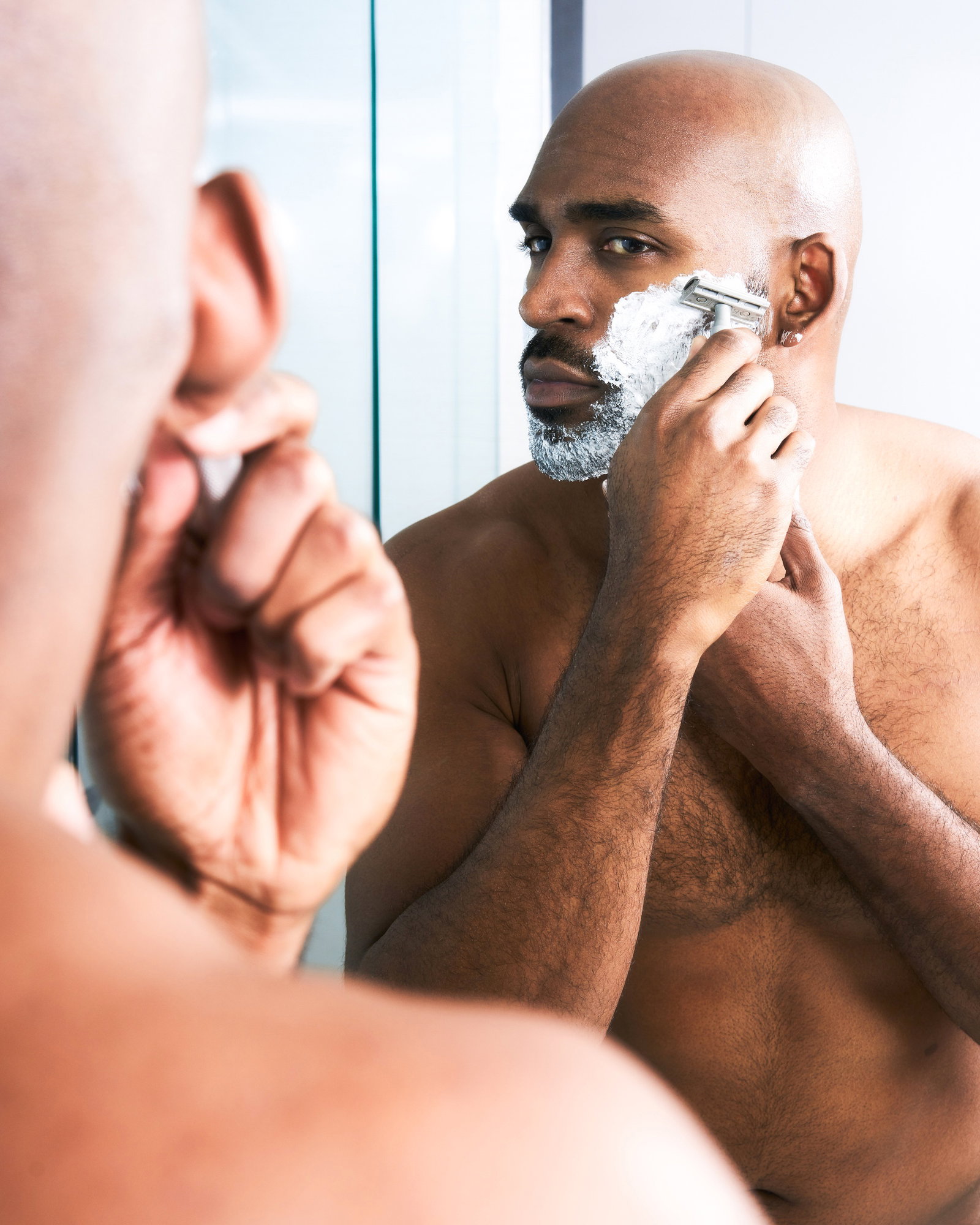 A dad shaving with a Rockwell razor
