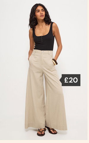 Beige linen rich palazzo trousers £20.