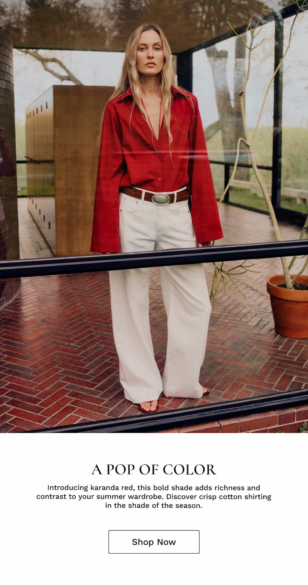 Image of a model in a red top and white pants with black text beneath.