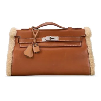A Unique Custom Fauve Barénia Leather & Ecru Mouton Shearling Teddy Kelly Muff Pochette With Palladium Hardware