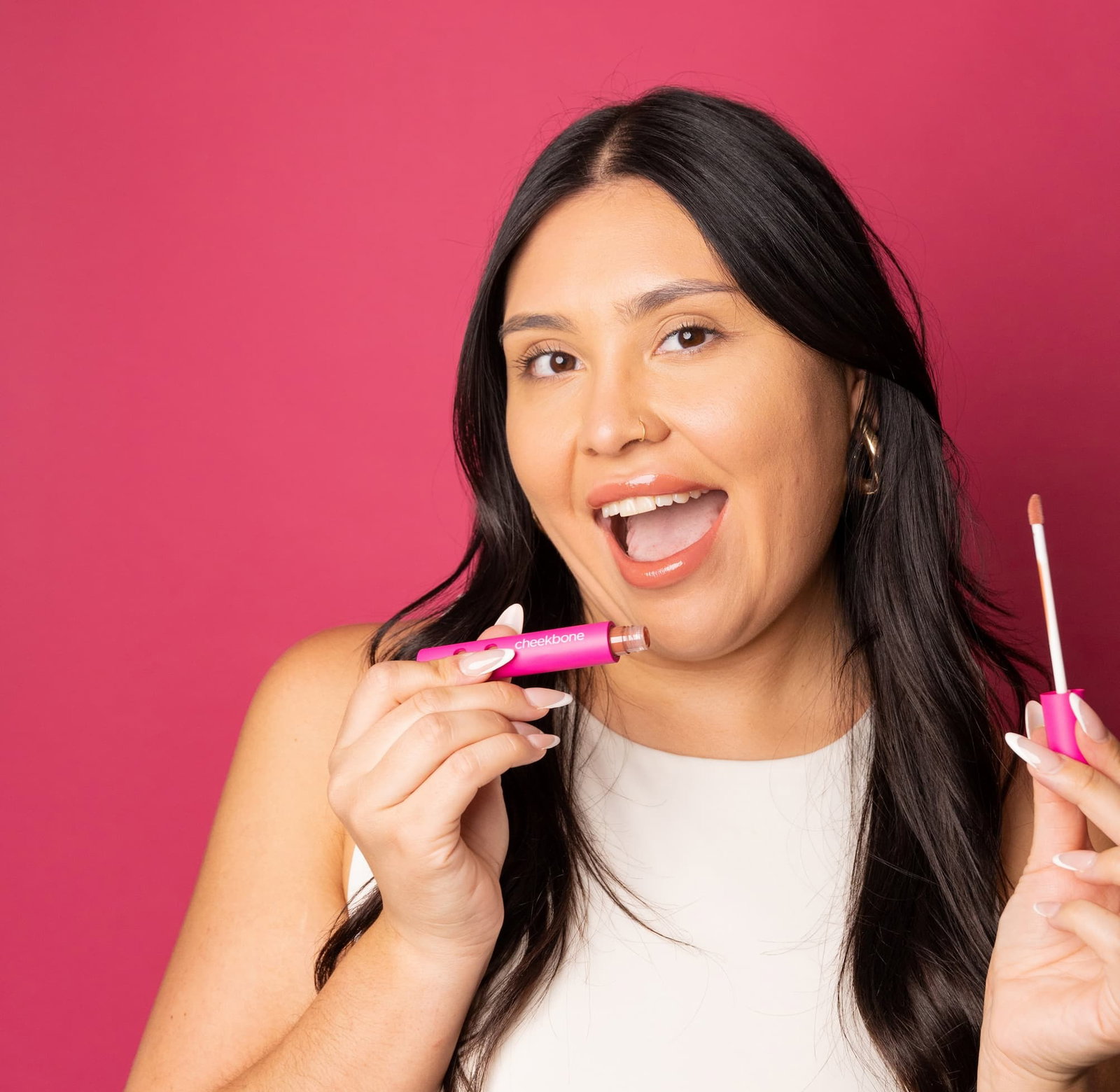 delian holding lip gloss