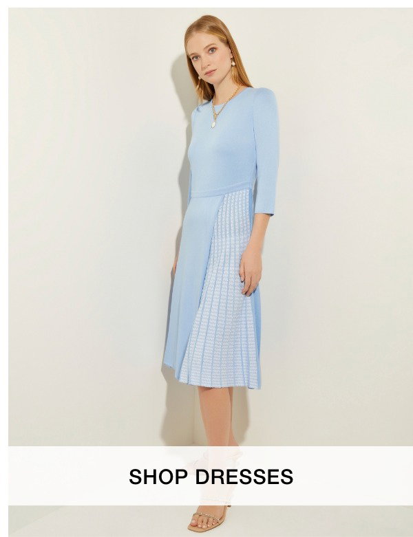 SHOP DRESSES >>