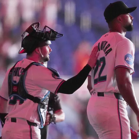 Marlins catcher Liam Hicks and Sandy Alcantara after a complete game in April.