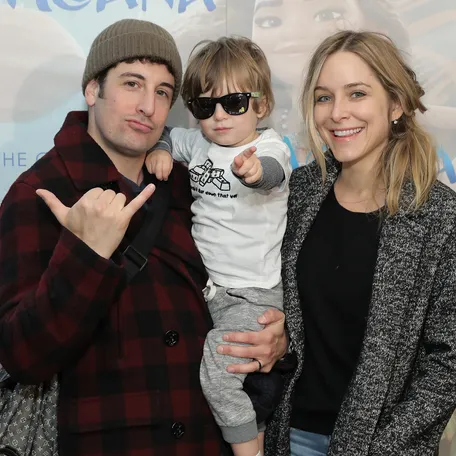 Jenny Mollen, right, and then-husband Jason Biggs, left, pose with son Sid Biggs while attending the Cinema Society screening of Disney's "Moana" at Metrograph in New York City on Nov. 20, 2016.