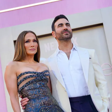 Jennifer Lopez and Brett Goldstein attend the Netflix's "Office Romance" World Premiere at The Egyptian Theatre Hollywood on May 26, 2026 in Los Angeles.