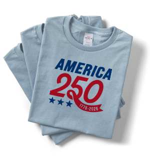 A stack of light blue t-shirts customized with an America 250 design.
