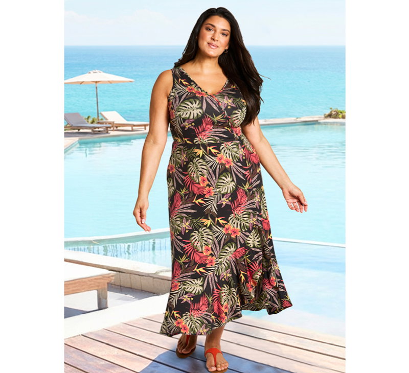 Ein Model trägt einschwarz-burgund-bedrucktes Jerseykleid mit tropischem Print