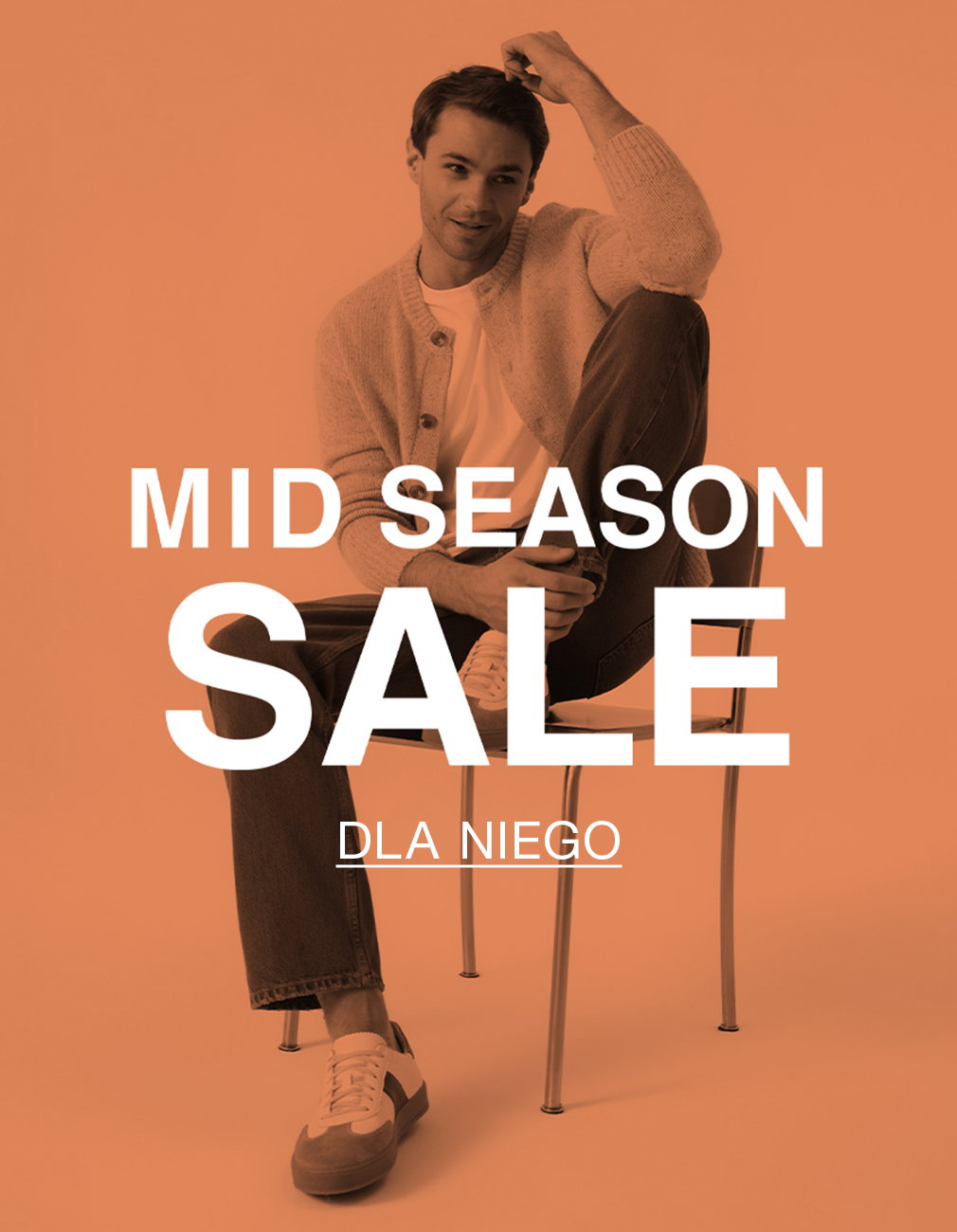 Mid season sale for men, featuring a man sitting on a chair in casual attire.