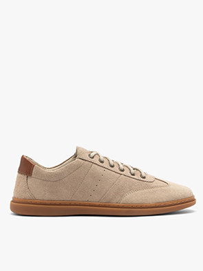 Beige casual trainer with brown sole and heel accent on white background.