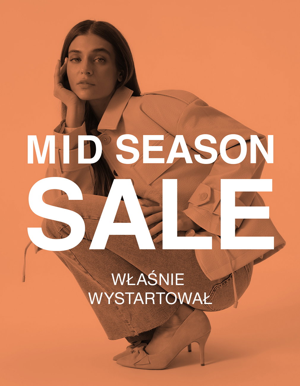 Fashionable woman in orange background promoting mid-season sale.