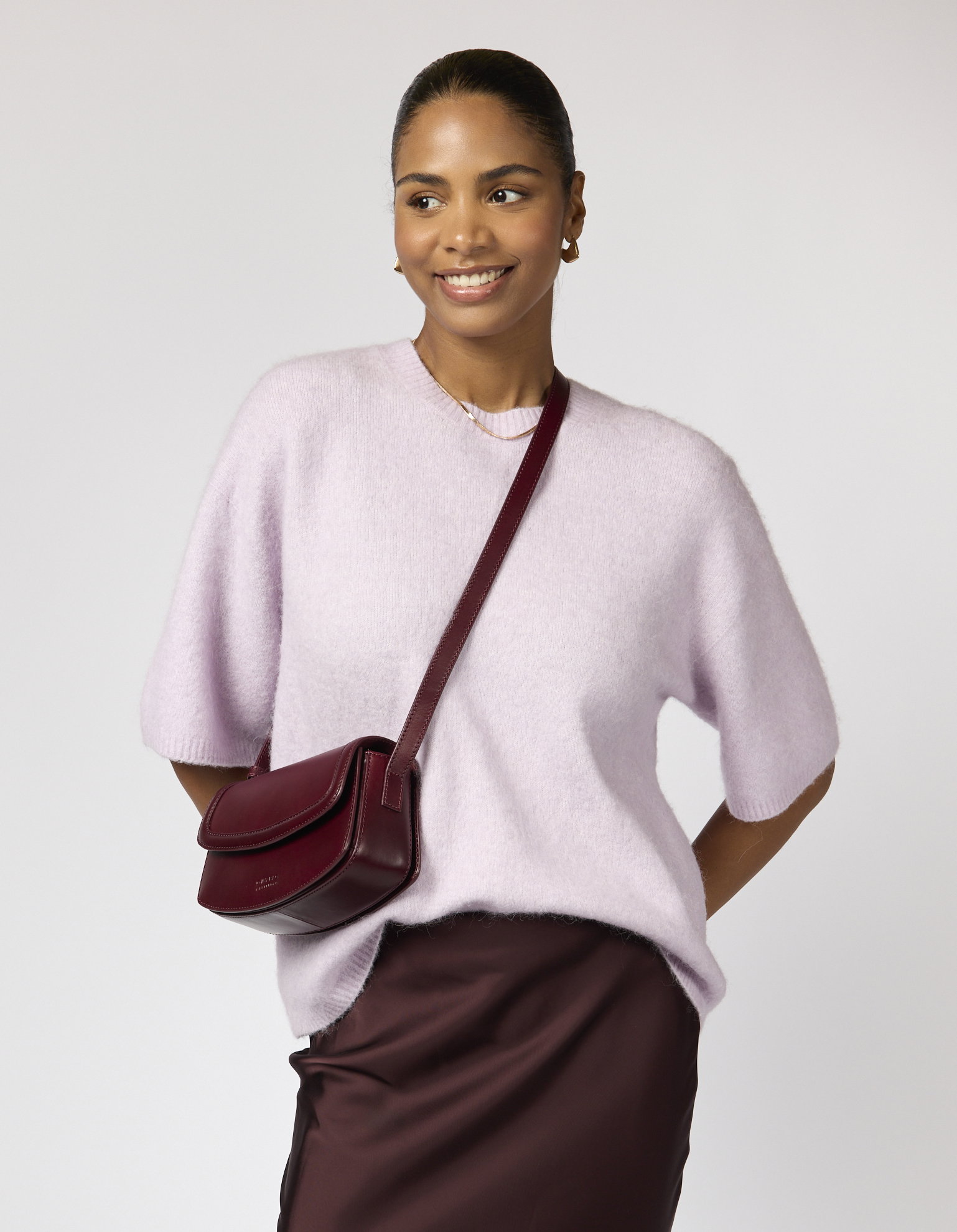 Model wearing Kendalini in Dark Cherry