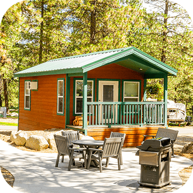 A KOA cabin at a campsite.