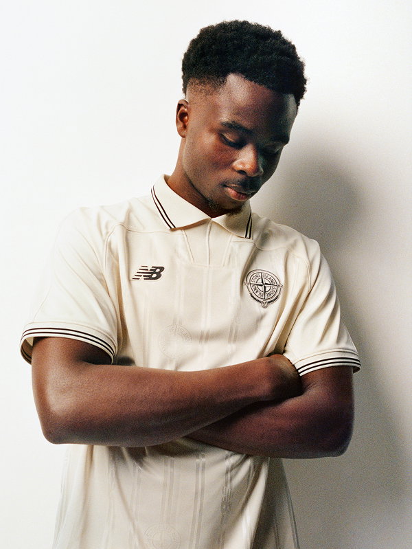 Hero Bukayo Saka wearing Stone Island x New Balance