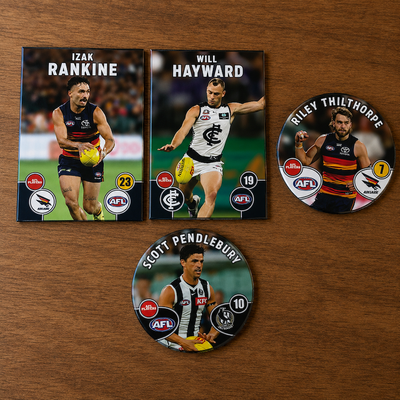 AFL Action Badges and Fridge Magnets sitting on a table