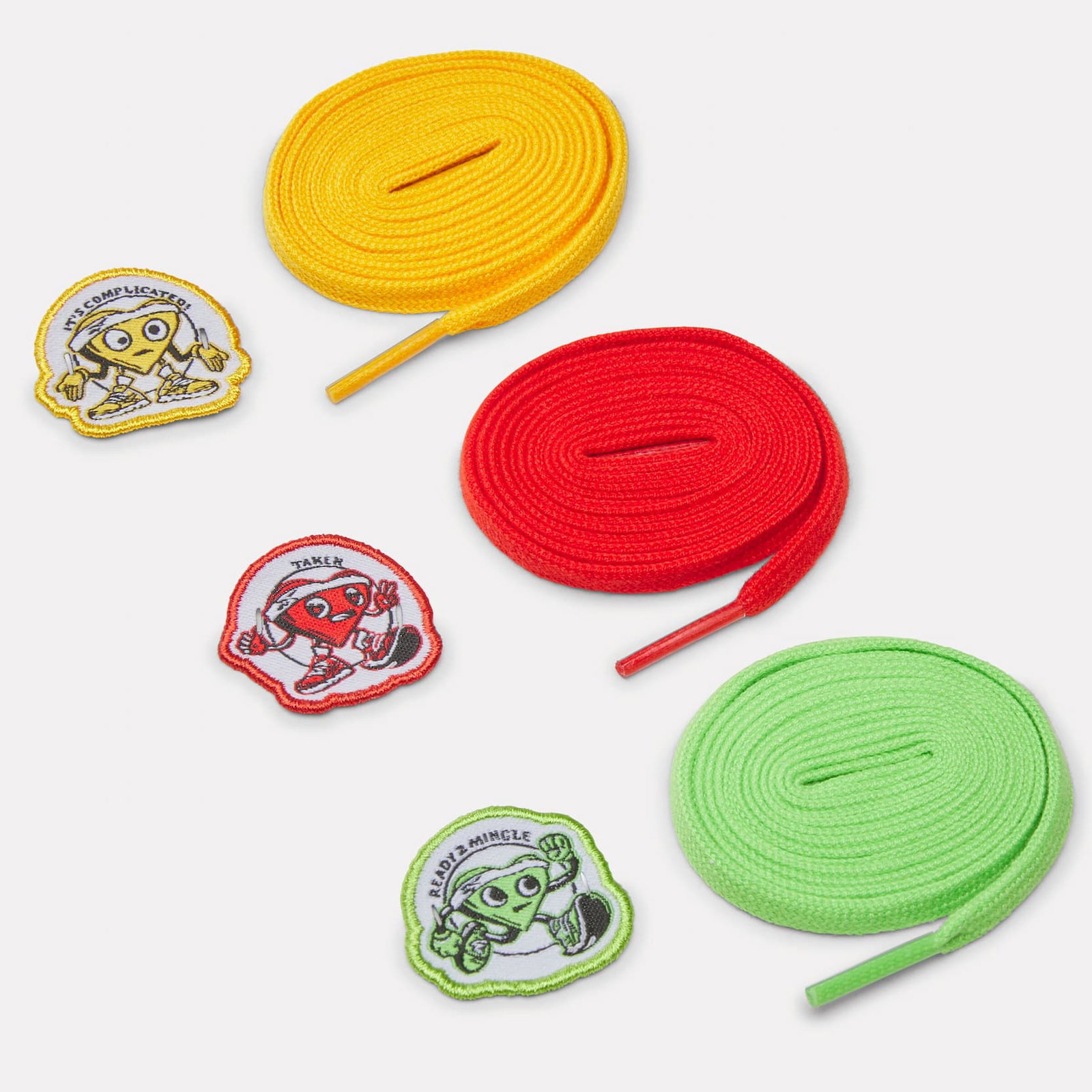 Colourful shoelaces and interchangeable FloatZig 2 Solemates patches in yellow, red, and green. Designed to personalize your running shoes and showcase your status.