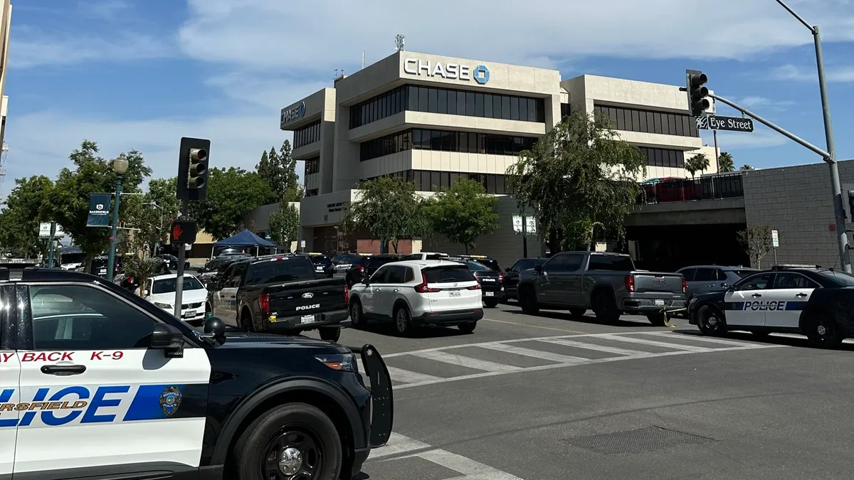 Local police at the Chase Bank building in Bakersfield, California, on Tuesday, June 2, 2026. Officers respond after a man barricaded himself inside the bank.
