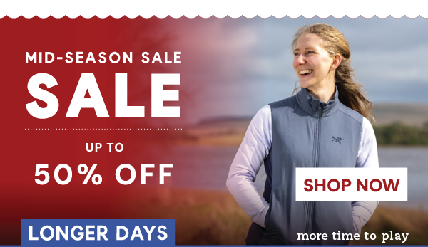 MID-SEASON SALE: UP TO 50% OFF. SHOP NOW. A smiling woman wearing Arc'teryx Women's Atom Vest in DK Stratus. Longer Days: More Time To Play. 