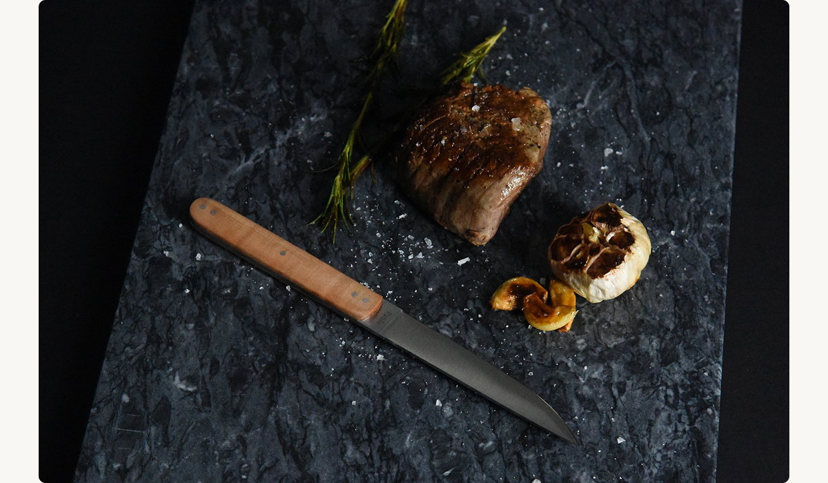 Hand-forged Japanese blade. Handmade Canadian Walnut handle. Limited edition. Only 350 sets.