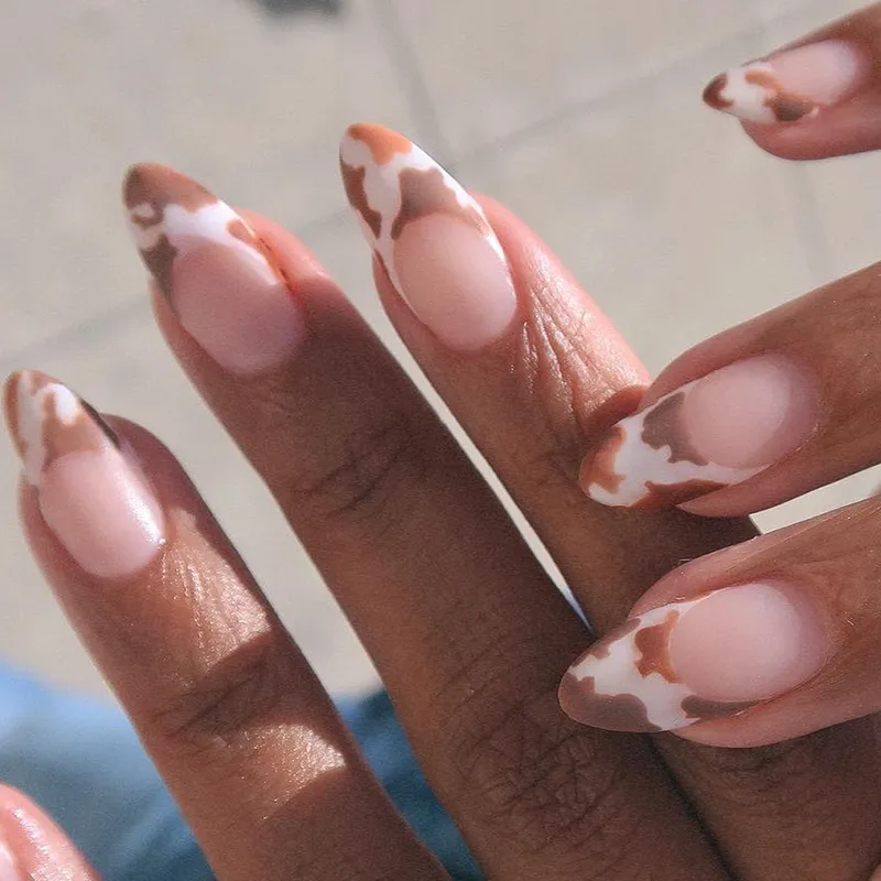 woman with cowgirl nails