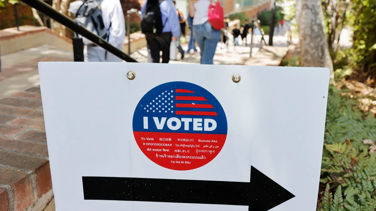 An "I Voted" sign points to a Vote Center after Democratic gubernatorial candidate Tom Steyer spoke at a Get the Youth Vote with Bruin Democrats event at UCLA's campus on June 1, 2026 in Los Angeles, California.