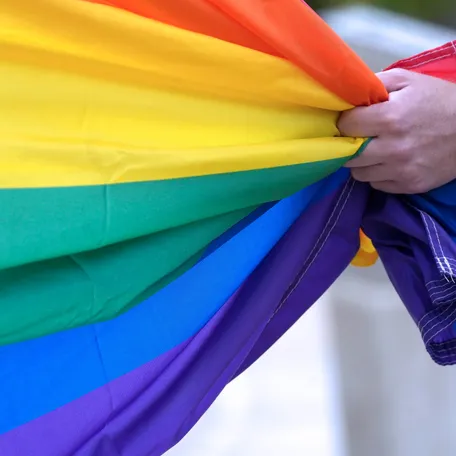 Milwaukee County employee, Joe De Gail, keeps a tight rein on the Intersex Progress Pride Flag before it was raised at Milwaukee County Courthouse for the kick off of Pride Month on June 1, 2026 at 930 W. Wells St., in Milwaukee, Wisconsin.