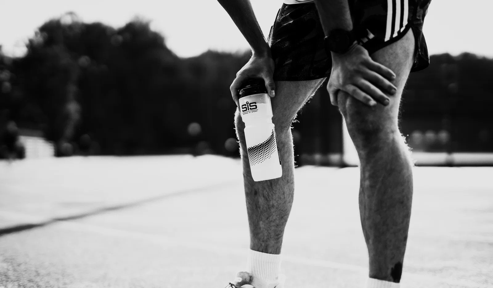 Runner with drink
