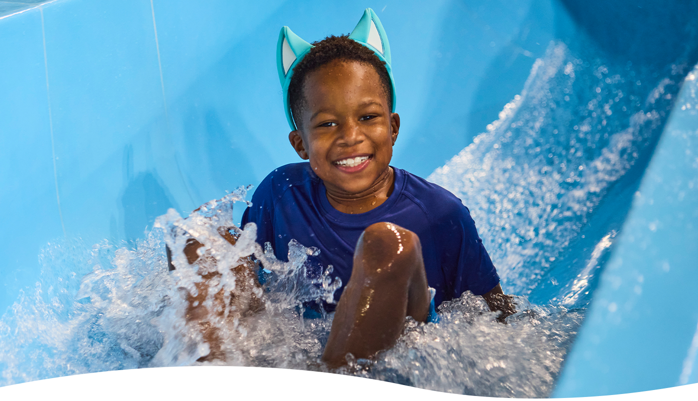 Boy enjoying the slide at Great Wolf Lodge