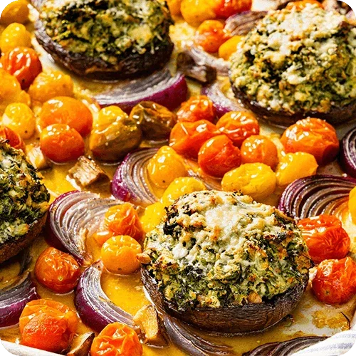 Spinach and Herb–Stuffed Mushrooms with Blistered Cherry Tomatoes