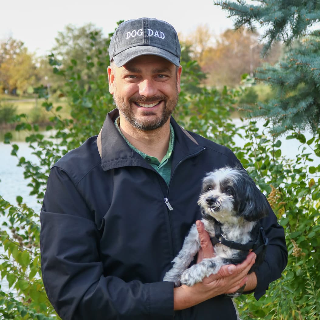 Man wearing dog dad baseball cap