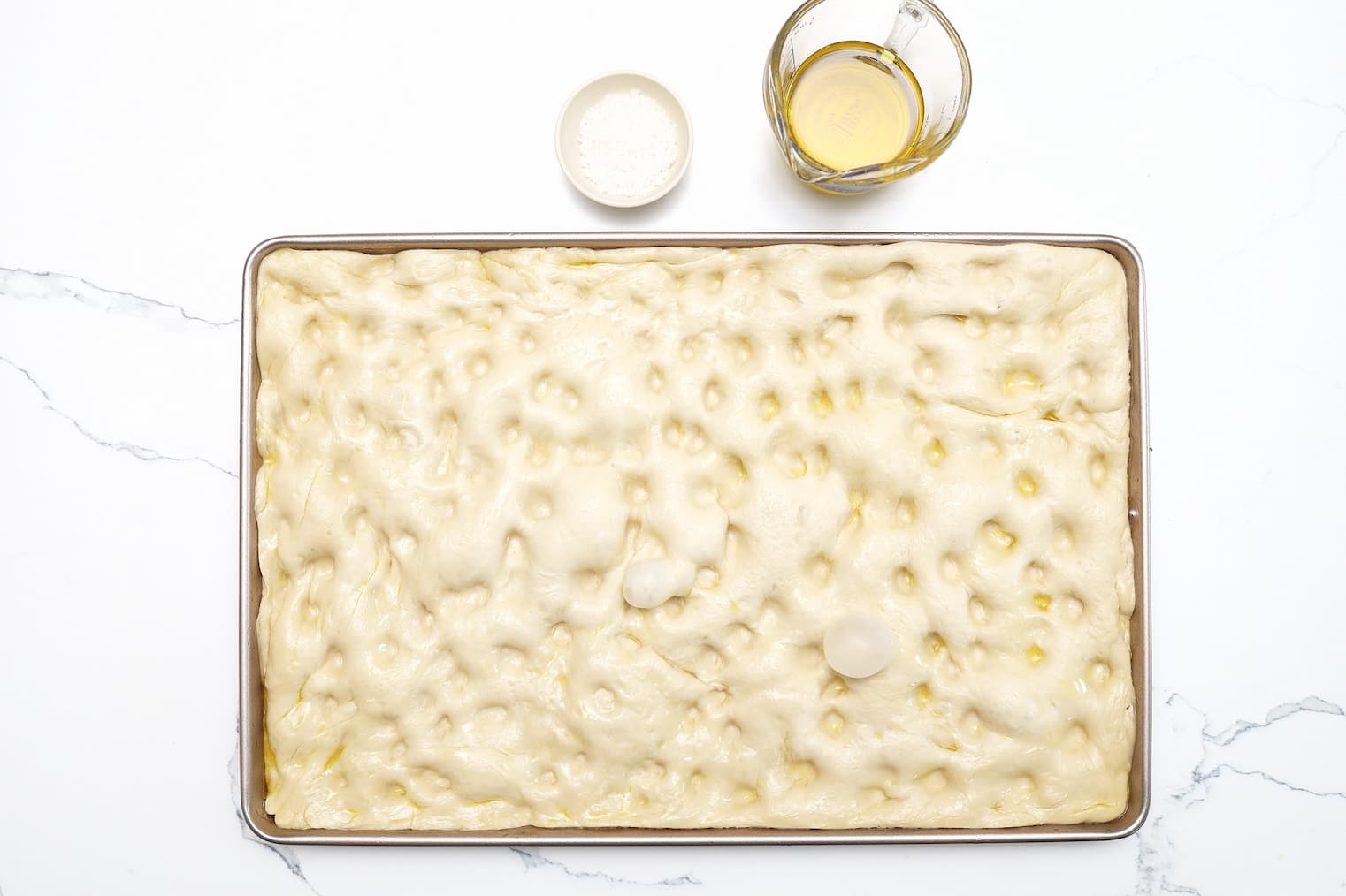 Garden Focaccia — dimpled crust decorated with herbs and tomatoes to look like a garden