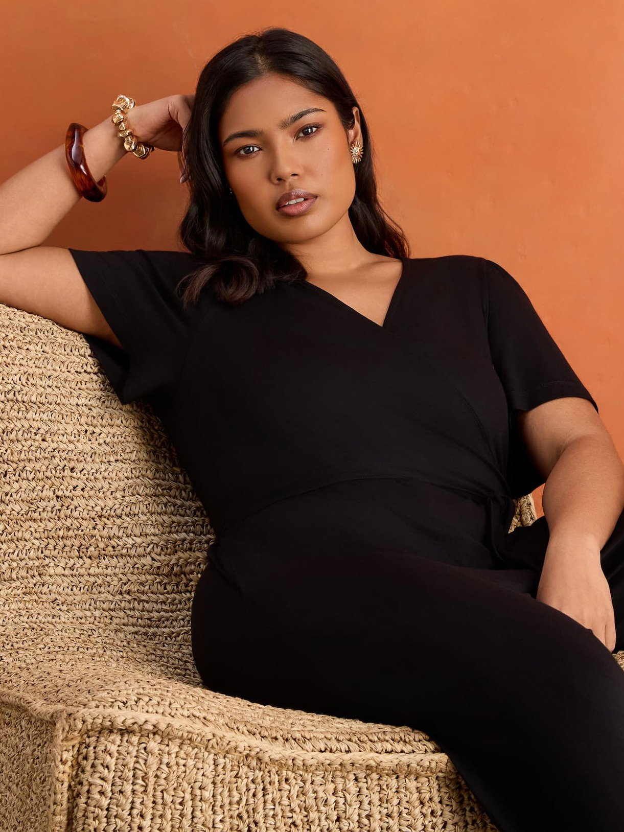 Black V Neck Wrap Flutter Sleeve Jersey Jumpsuit