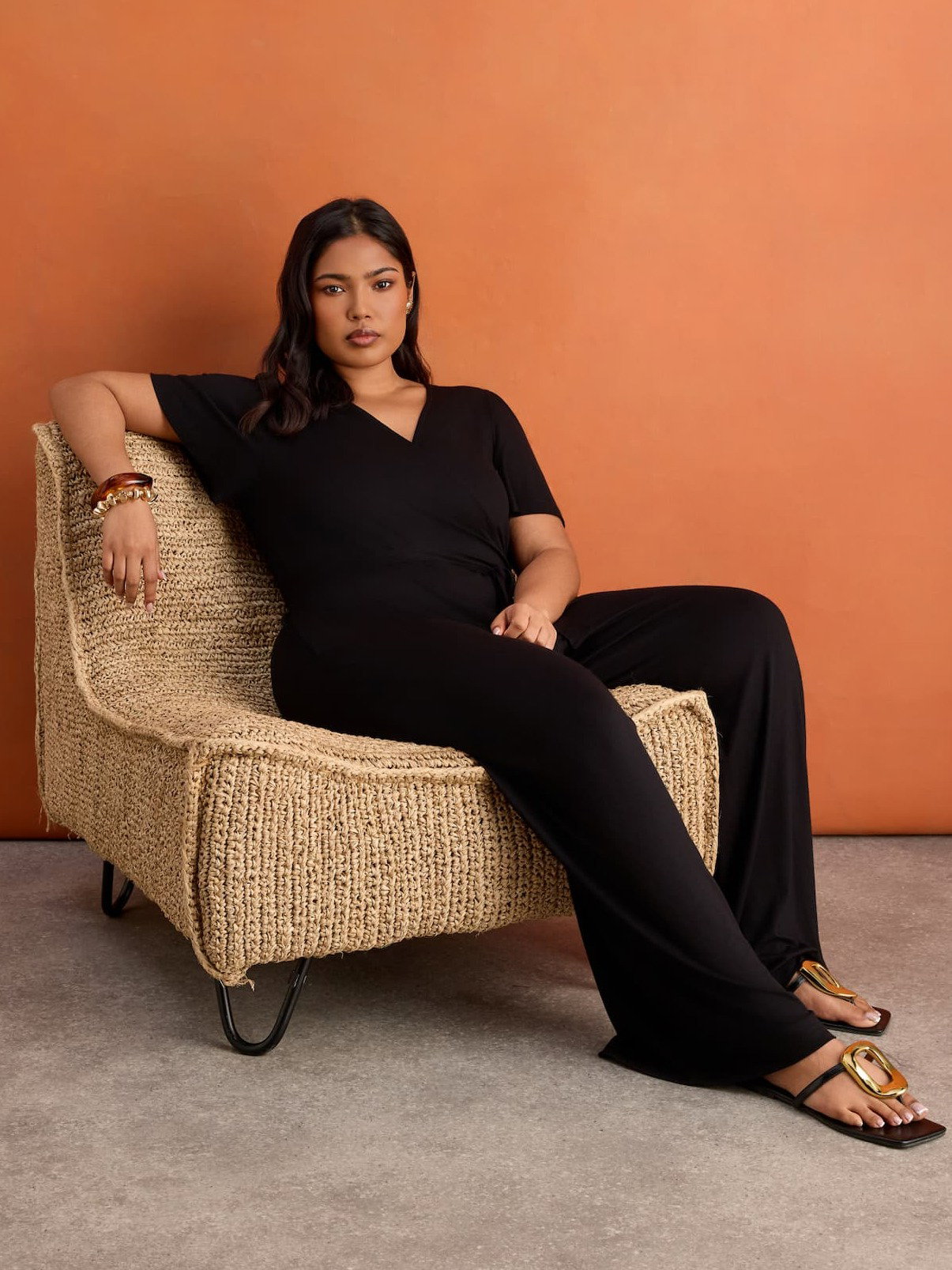 Black V Neck Wrap Flutter Sleeve Jersey Jumpsuit
