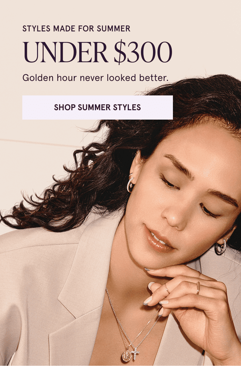 A model wearing gold diamond jewelry. Golden hour never looked better. Click here to shop summer styles under $300