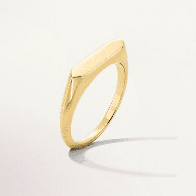 A gold hexagonal signet ring.