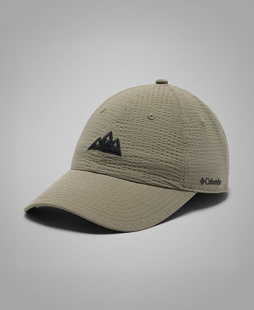 A dark green baseball cap with a mountain graphic on the front.