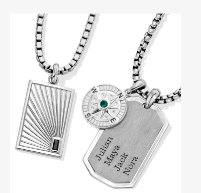 Silver pendant necklaces with engraved dog tag, compass charm, and rectangular pendant.