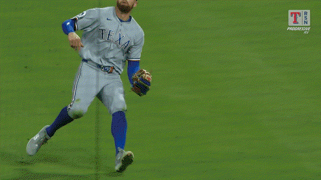 An animated gif of Cody Freeman making a juggling catch on a popup