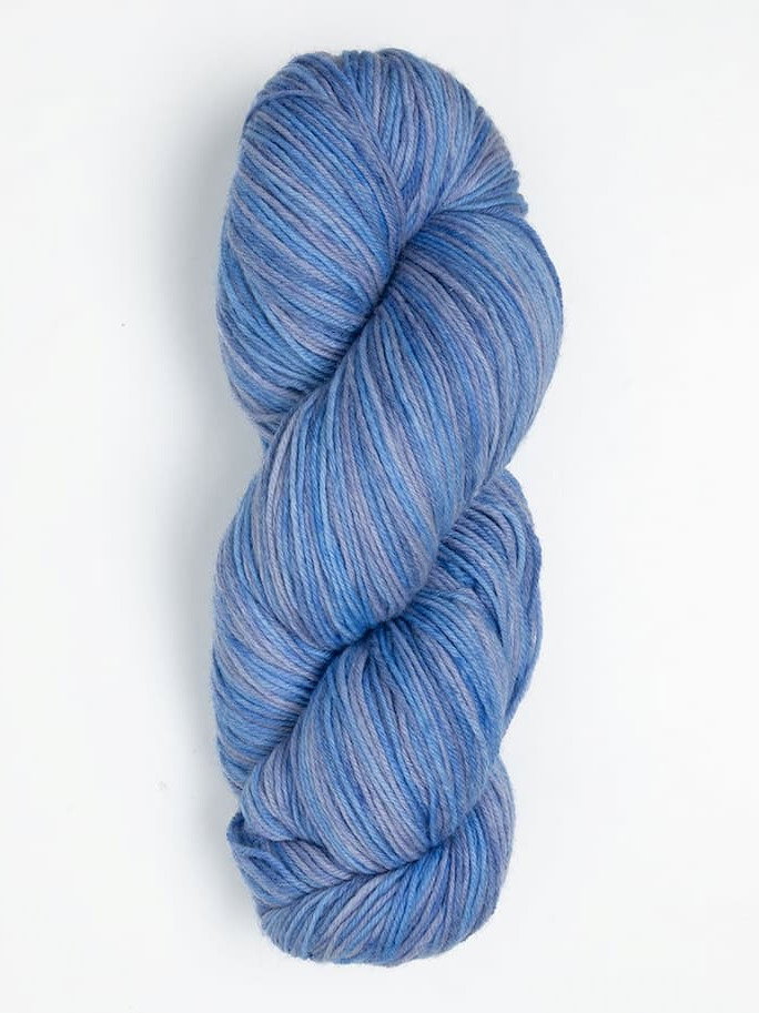 A skein of blue yarn with a variegated coloration. >>