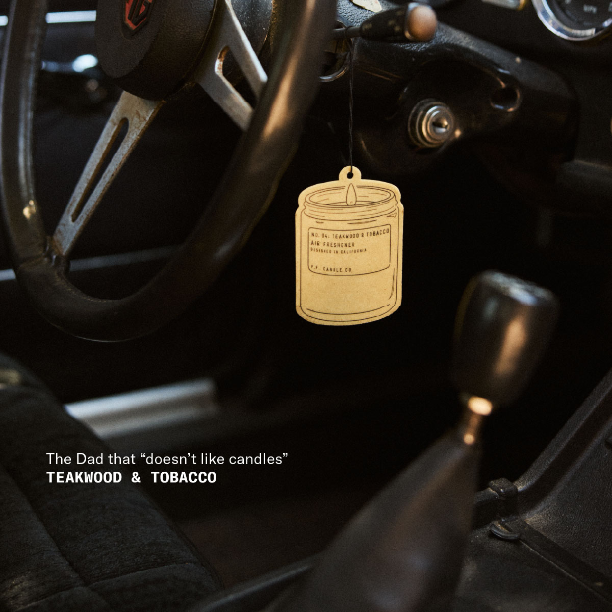 The Dad that “doesn’t like candles” Teakwood & Tobacco [air freshener hanging from gear shifter in car]