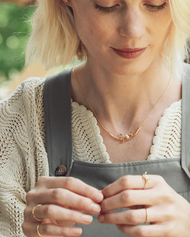 Model Wearing Two Birds on a Branch Necklace
