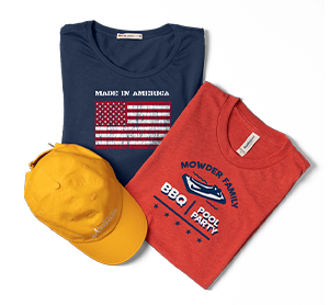 Two t-shirts and a baseball cap customized with summer designs.