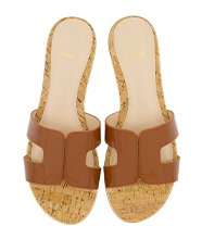 Pair of brown slide sandals.