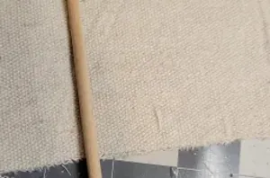 She places a wooden dowel over some scrap fabric for this gorgeously patriotic tablescape