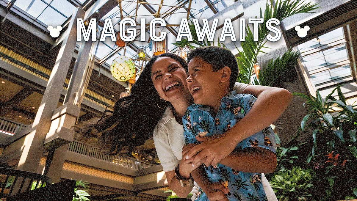 Magic awaits. A mother and her son smile as they share a hug.