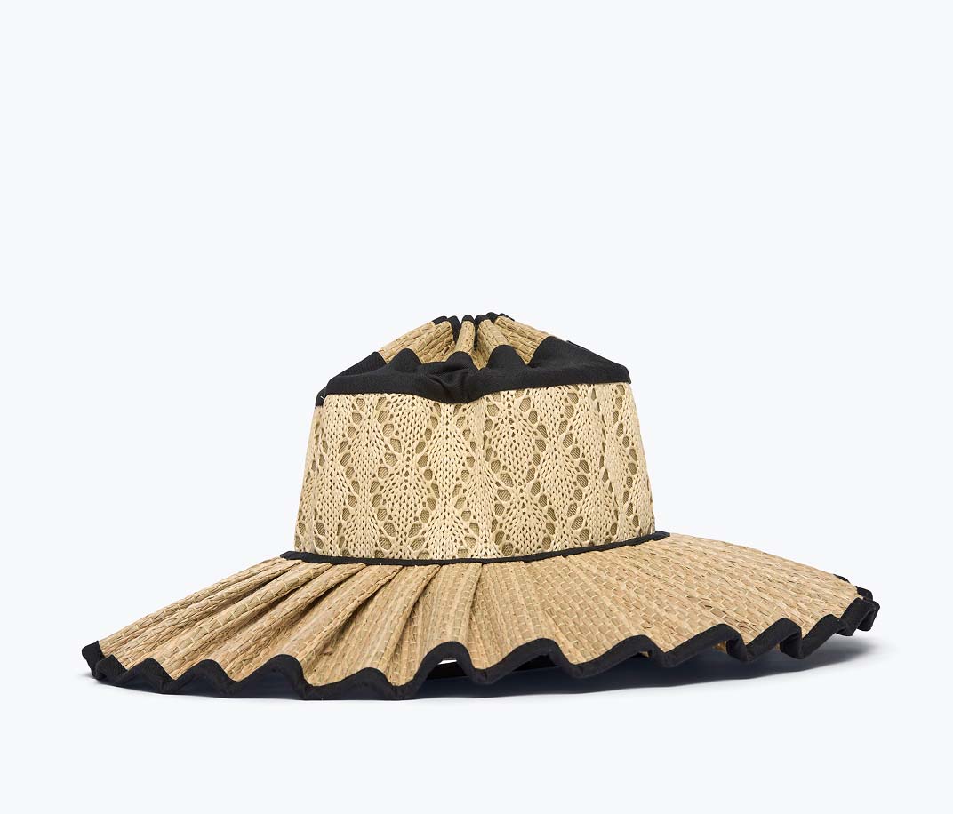 Sunhat with natural grass fibers on the brim and woven raffia