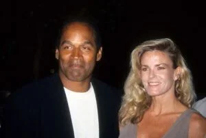 O.J. Simpson and Nicole Brown Simpson pose at the premiere of the "Naked Gun 33 1/3: The Final Isult" in which O.J. starred on March 16, 1994 in Los Angeles, California.